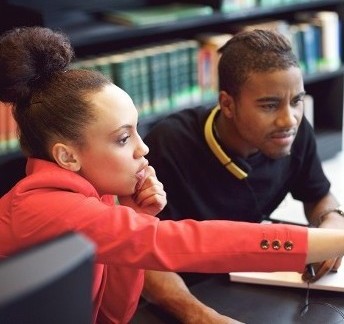Students working on a Computer